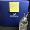 Crystal rabbit figurine in front of a Swarovski branded box