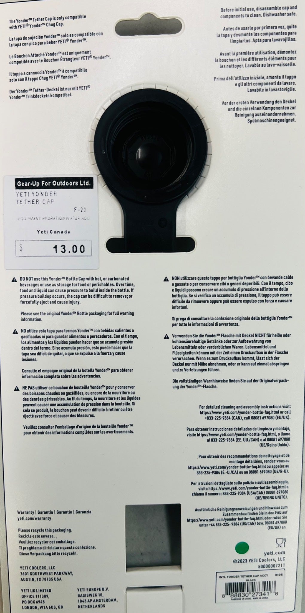 Black lens cap on a product packaging with text and branding