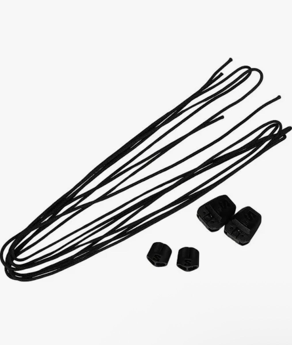 Black bicycle inner tube with valve caps on a white background