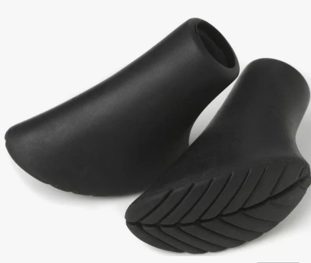 Black rubber footies on a white background