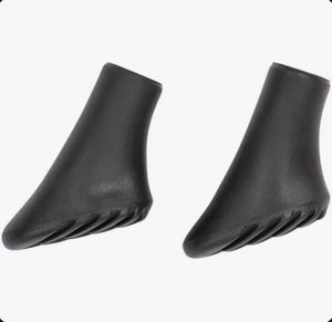 Pair of black five-toe shoes on a white background