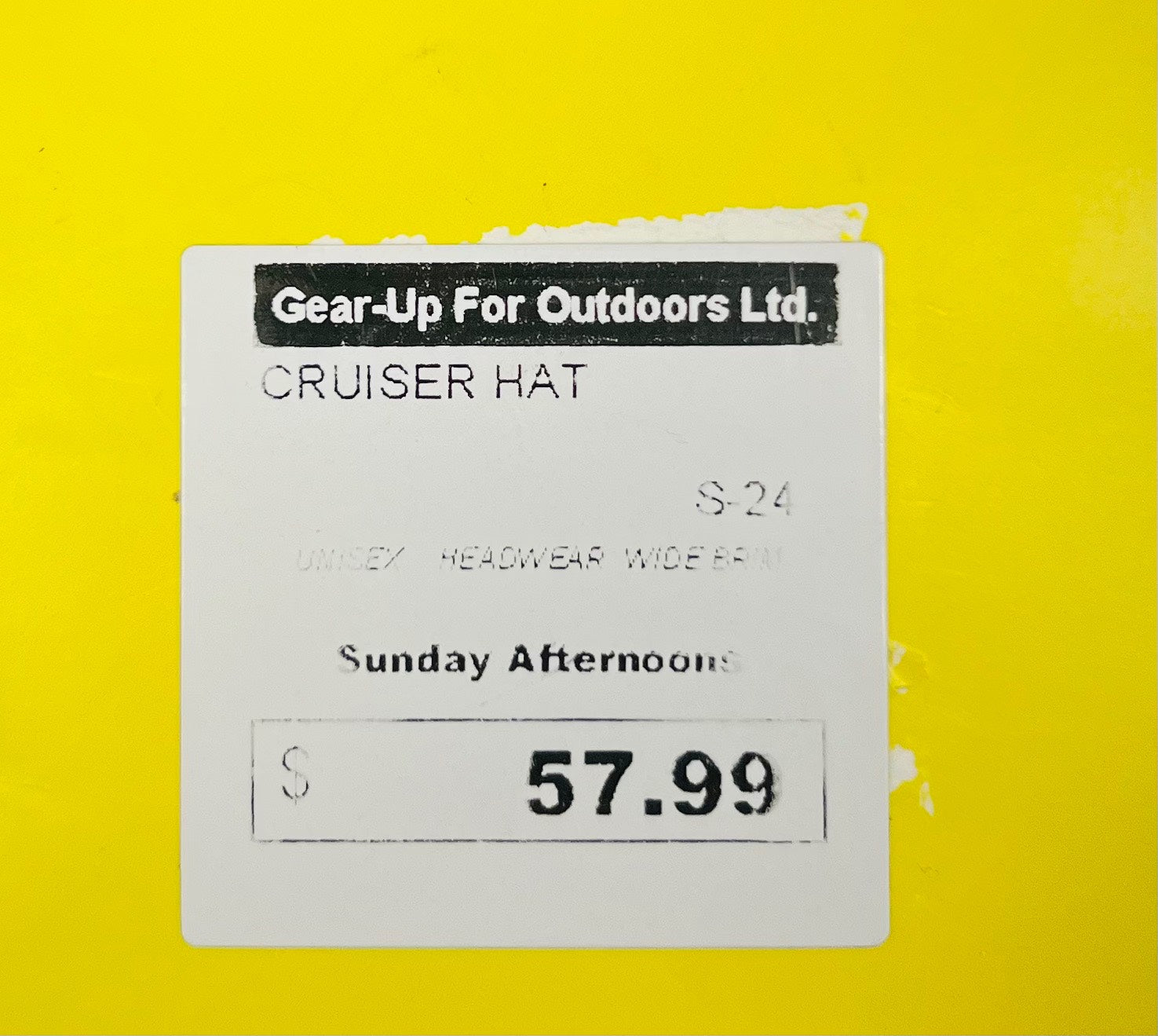 Price tag for a 'Cruiser Hat' from Gear-Up For Outdoors Ltd. on a yellow background