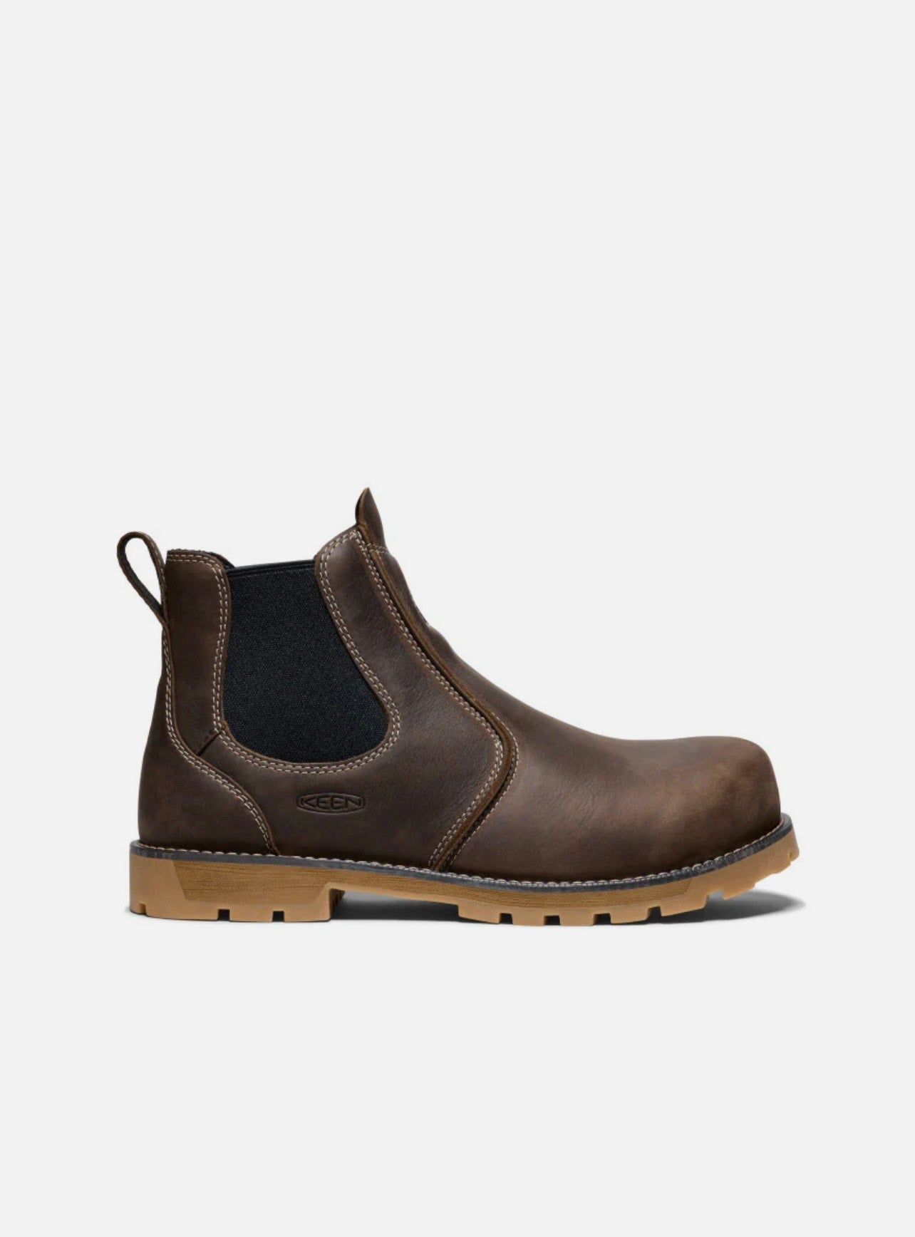 Brown leather boot with a black sole on a white background