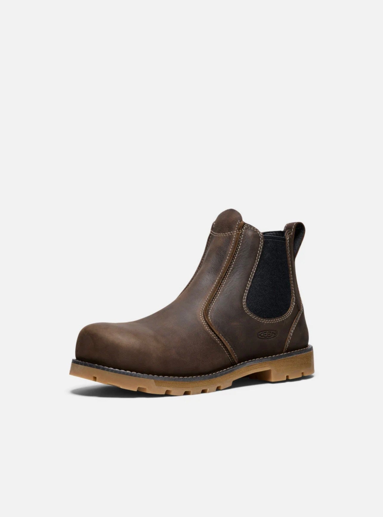 Brown leather Chelsea boot on a white background