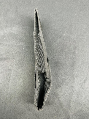 Textured pouch on a gray background