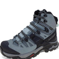 Gray hiking boot with black laces on a white background
