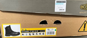 Cardboard box with a pair of boots on a shelf, featuring a label and price tag.