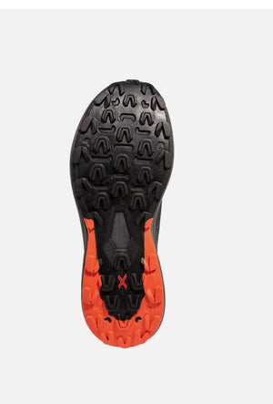 Close-up of a shoe sole with orange and black design on a white background