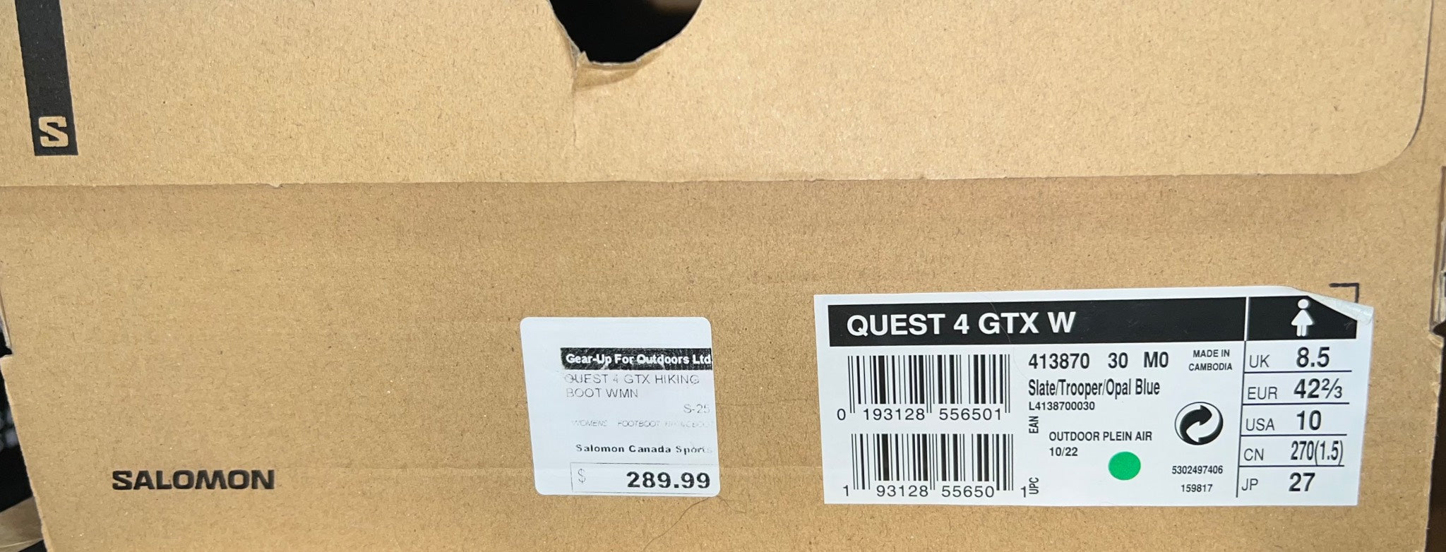 Salomon Quest 4 GTX W shoe box with labels and branding.