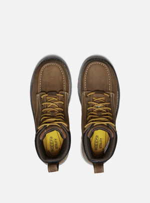 Pair of brown work boots with yellow laces on a white background