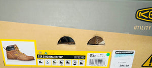 Box of Klima Utility boots with a label on a gray background