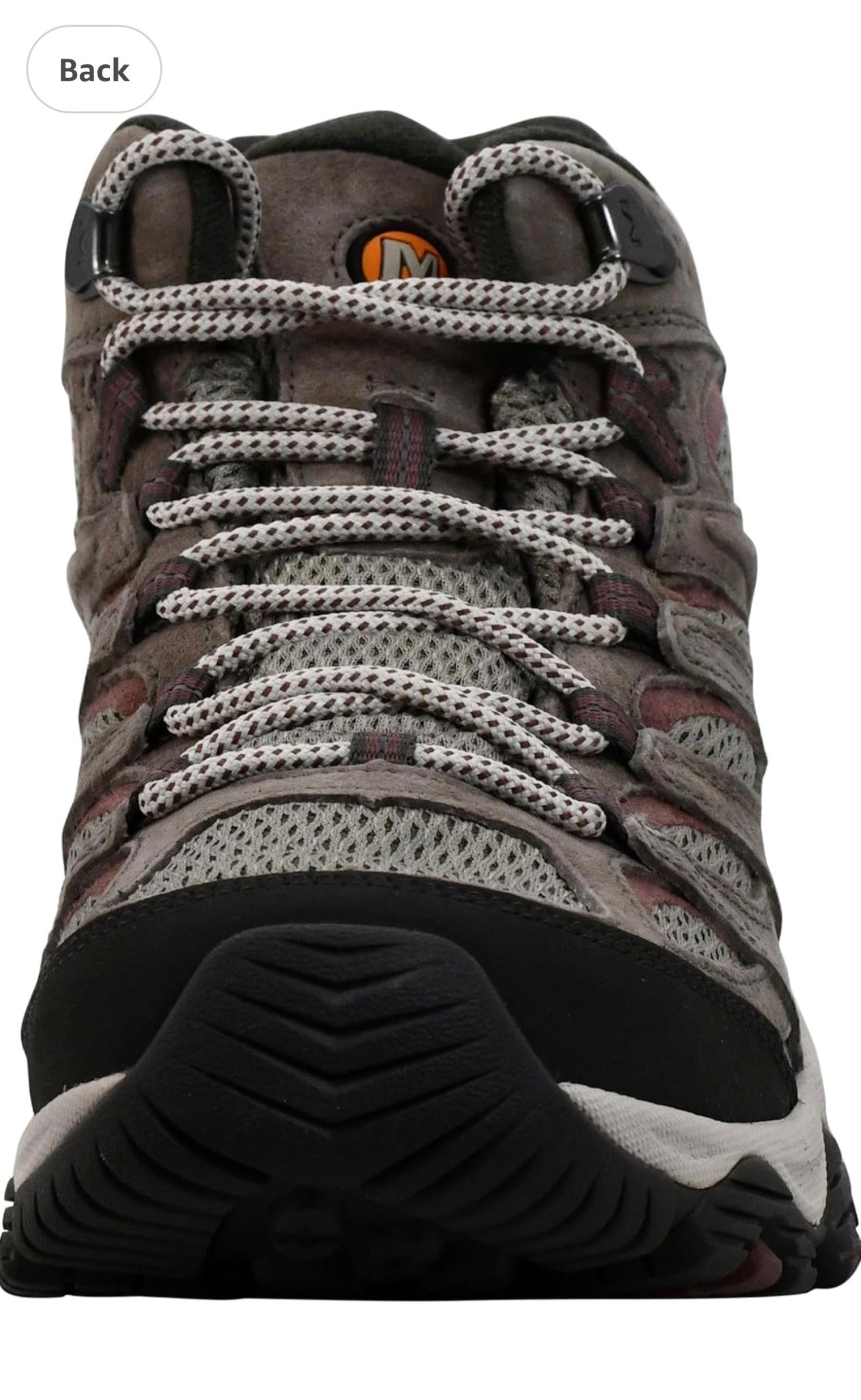 Close-up of a hiking boot with laces on a white background