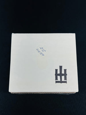White box with black and blue text on a black background