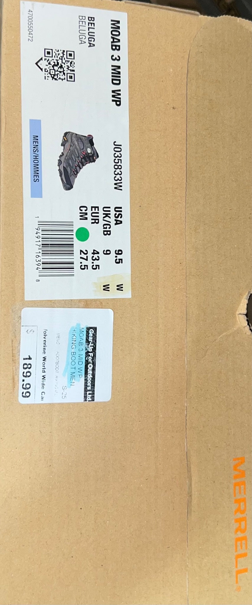 Cardboard box with product labels and a Merrell logo