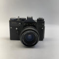 Vintage Zenit camera on a white background