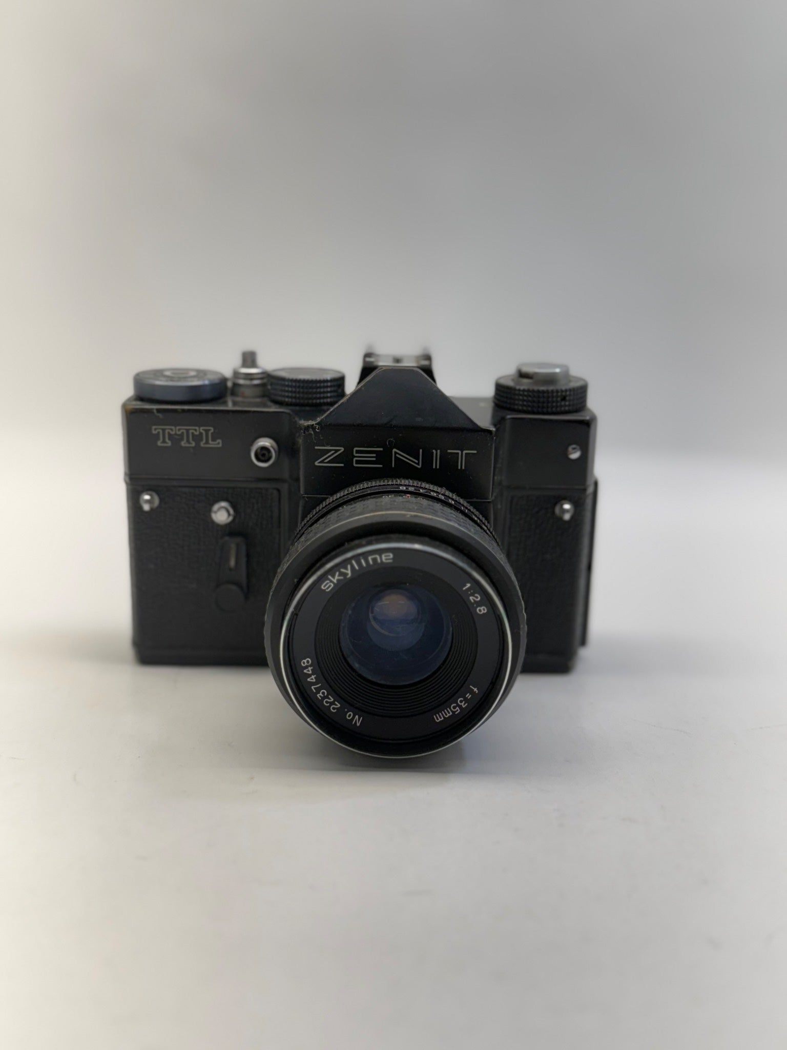 Vintage Zenit camera on a white background