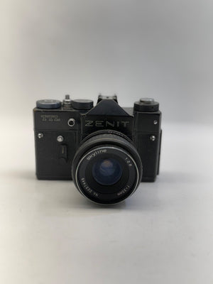 Vintage Zenit camera on a white background