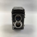 Vintage Minolta Autocord camera on a white background