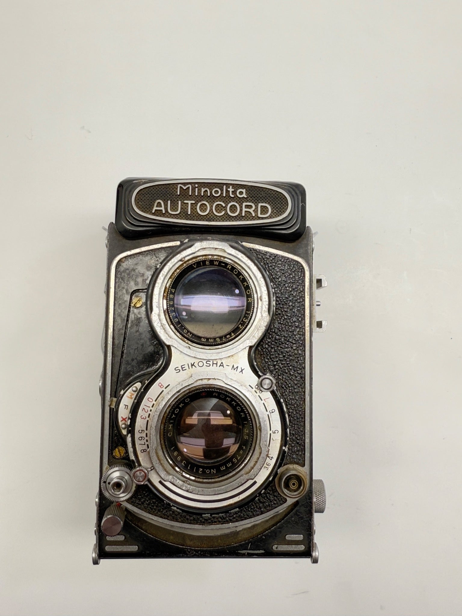 Vintage Minolta Autocord camera on a white background