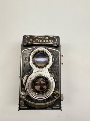 Vintage Minolta Autocord camera on a white background