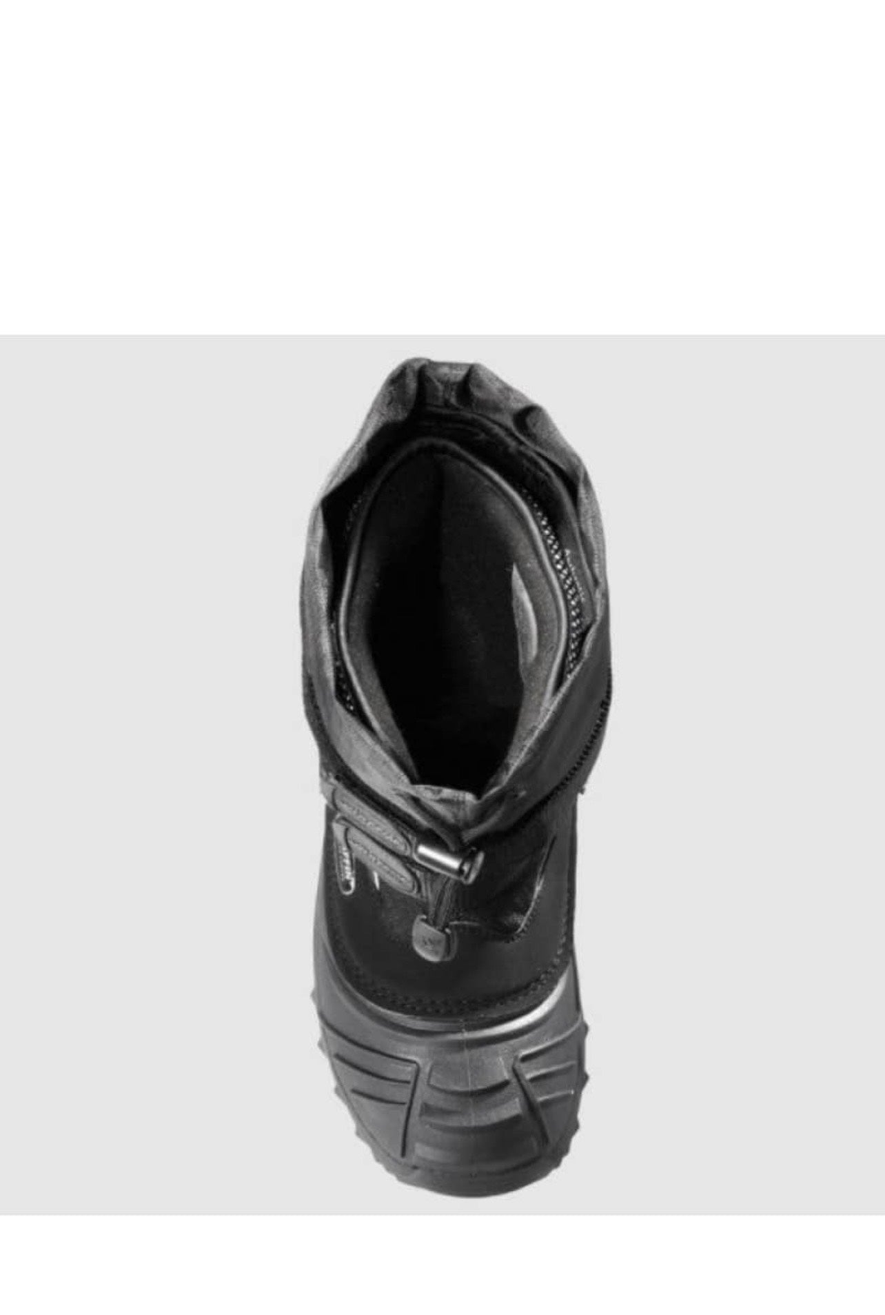 Black boot on a light gray background