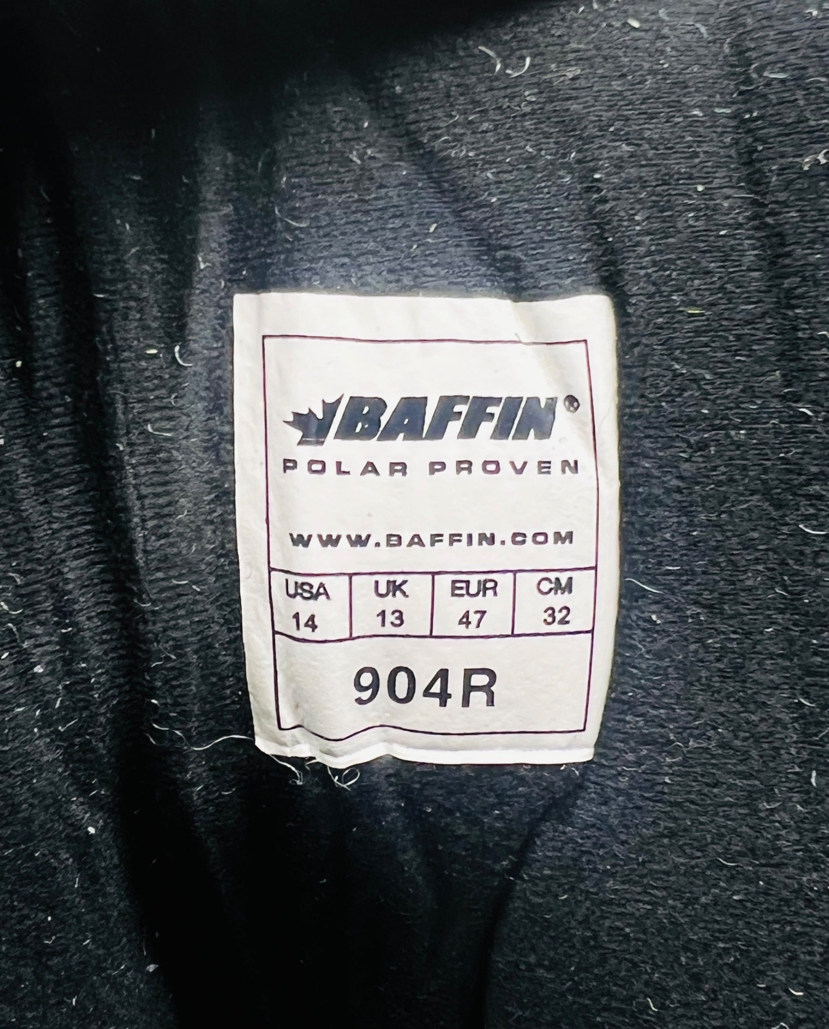Baffin brand label on a dark fabric background