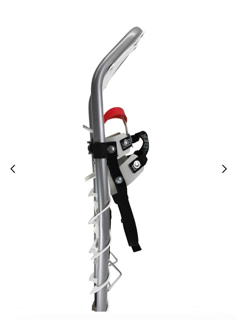 Metal snowshoe with red and white accents on a white background