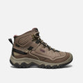 Brown hiking boot on a white background