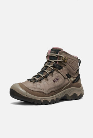 Brown hiking boot on a white background