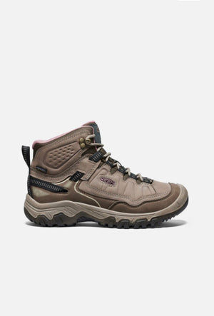 Brown hiking boot on a white background