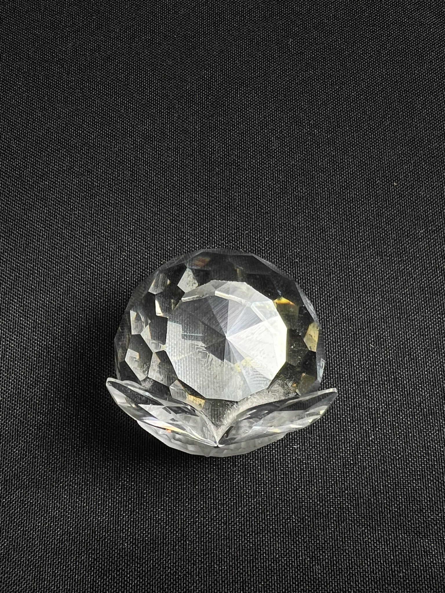Faceted crystal on a black background
