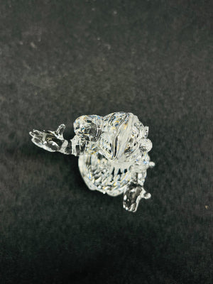 Crystal figurine of a horse on a dark background