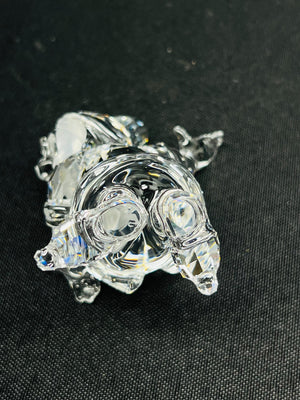 Crystal turtle figurine on a black background