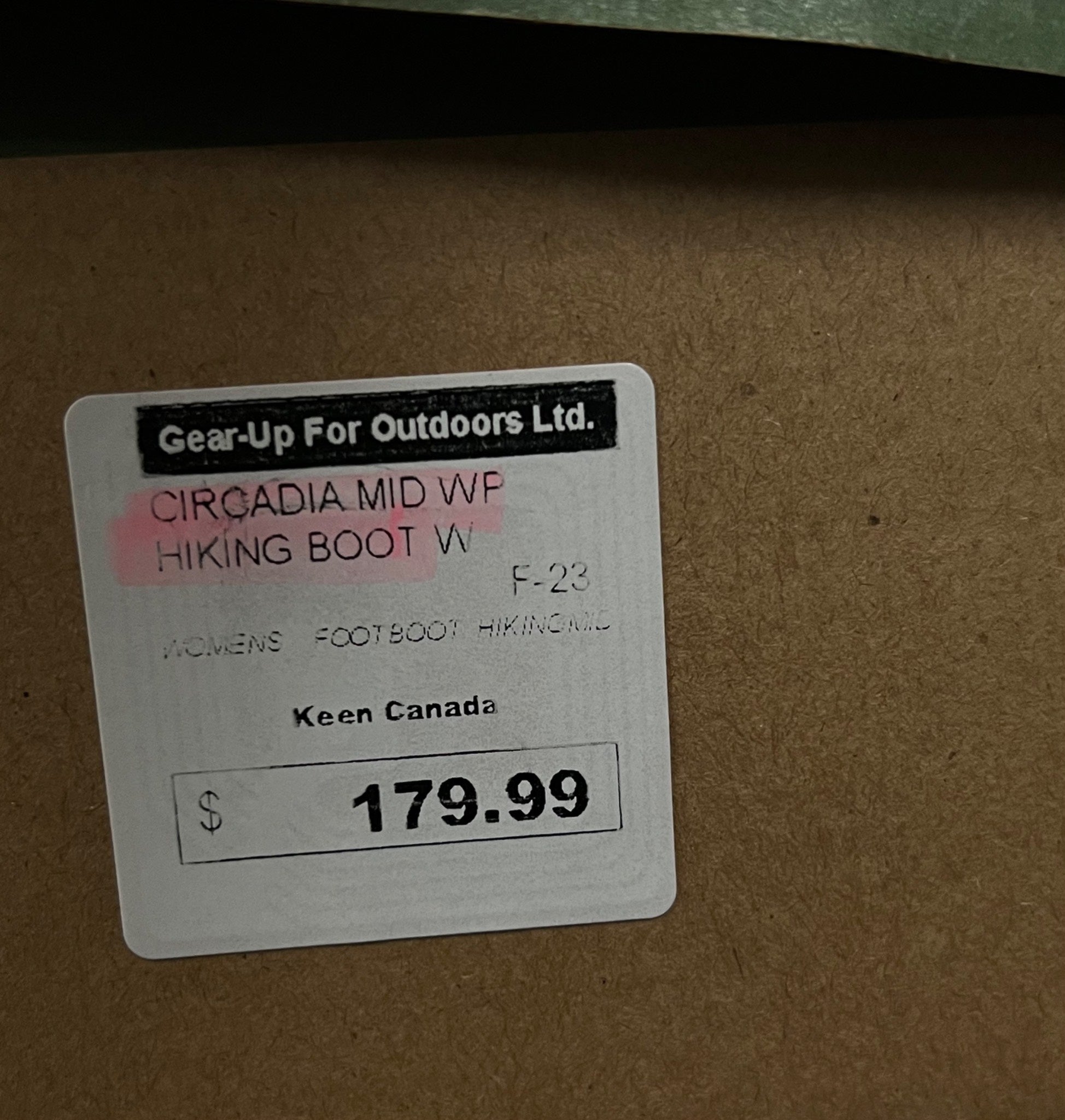 Price label for 'Cirradia Mid WF Hiking Boot W' on a cardboard surface
