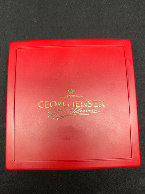 Red Georg Jensen box on a black background