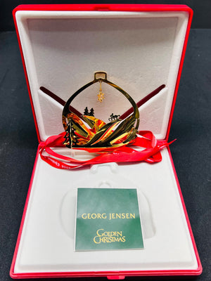 Georg Jensen Christmas ornament in a red and white box with a card.