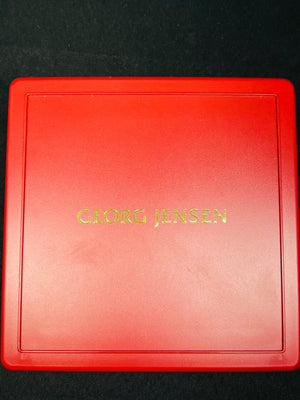 Red Georg Jensen box on a black background