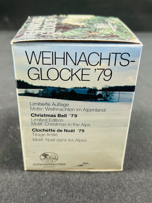 Box labeled 'Weihnachts-Glocke '79' with Christmas scene design on a gray background