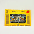 Packaged New Zealand stamps with yellow border and clear window