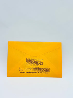 Yellow envelope with black text on a light gray background