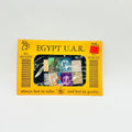 Collection of Egyptian stamps in a display case with a yellow border on a light gray background