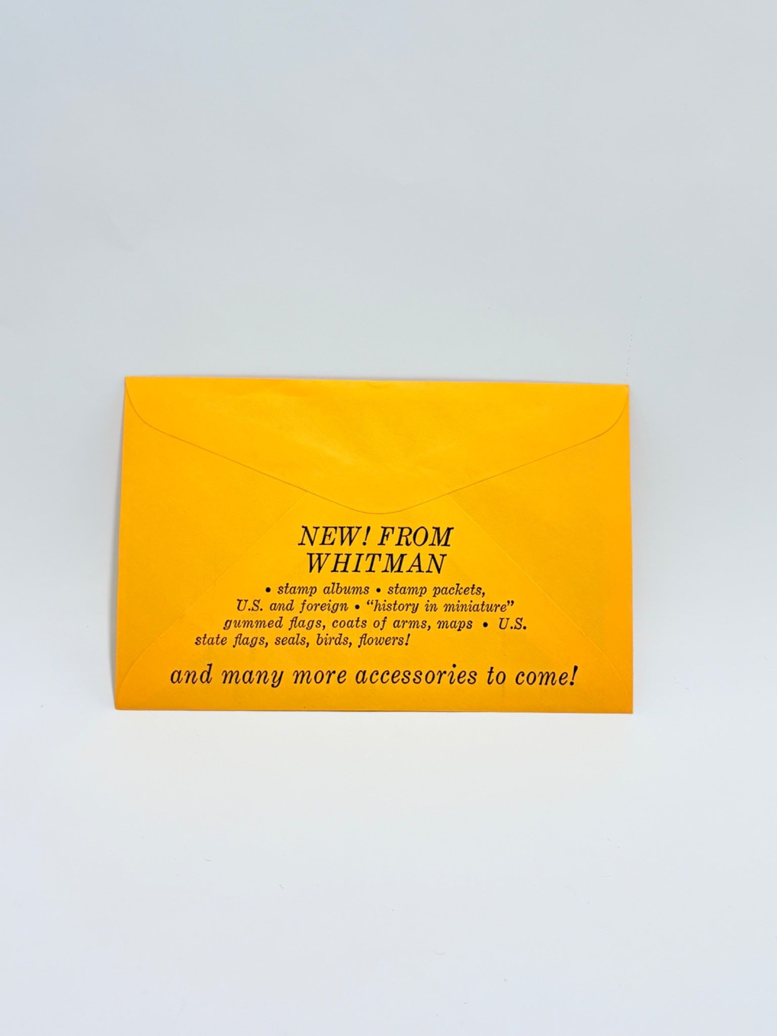 Yellow card with black text on a light gray background