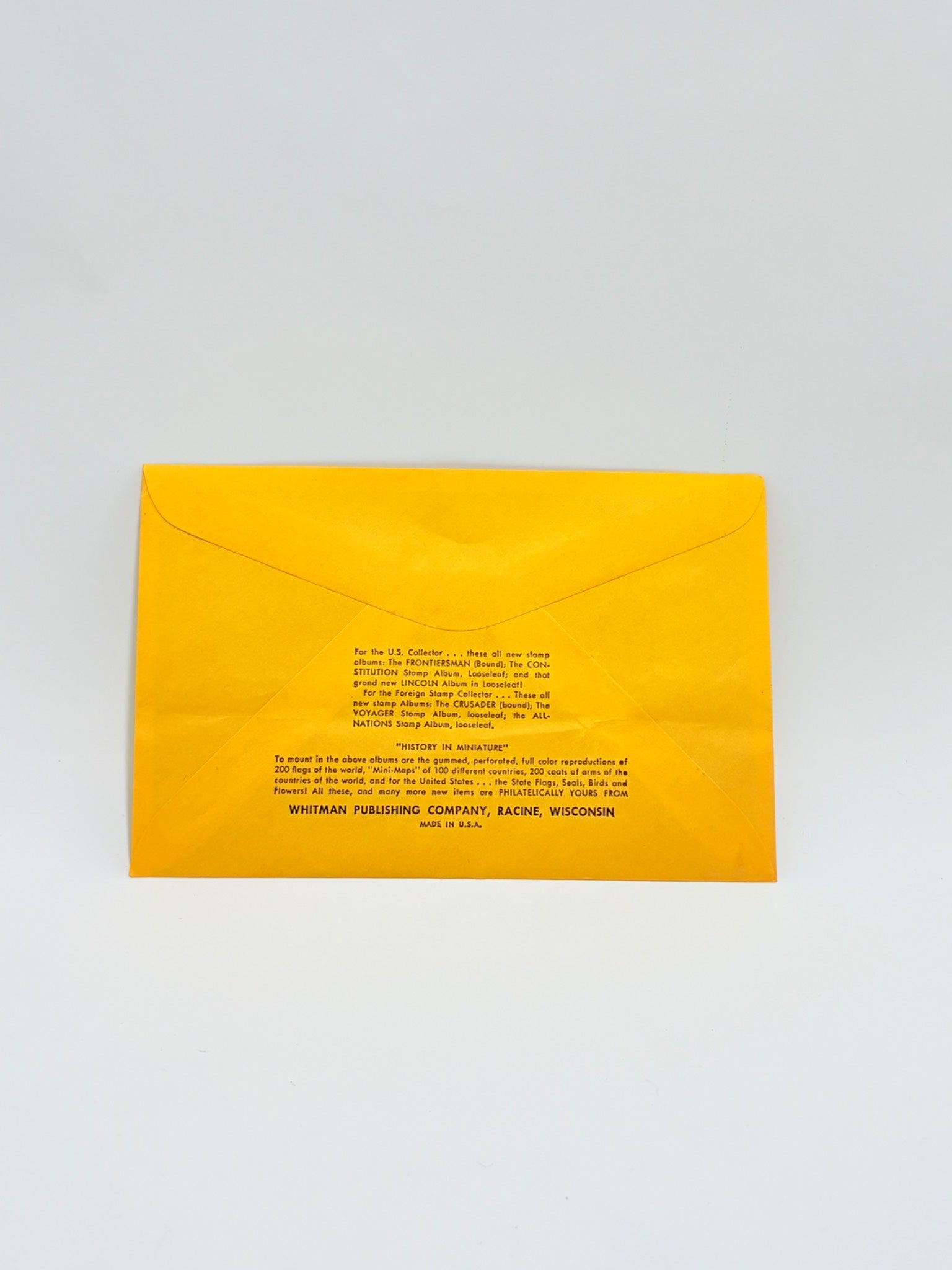 Yellow envelope with text on a white background