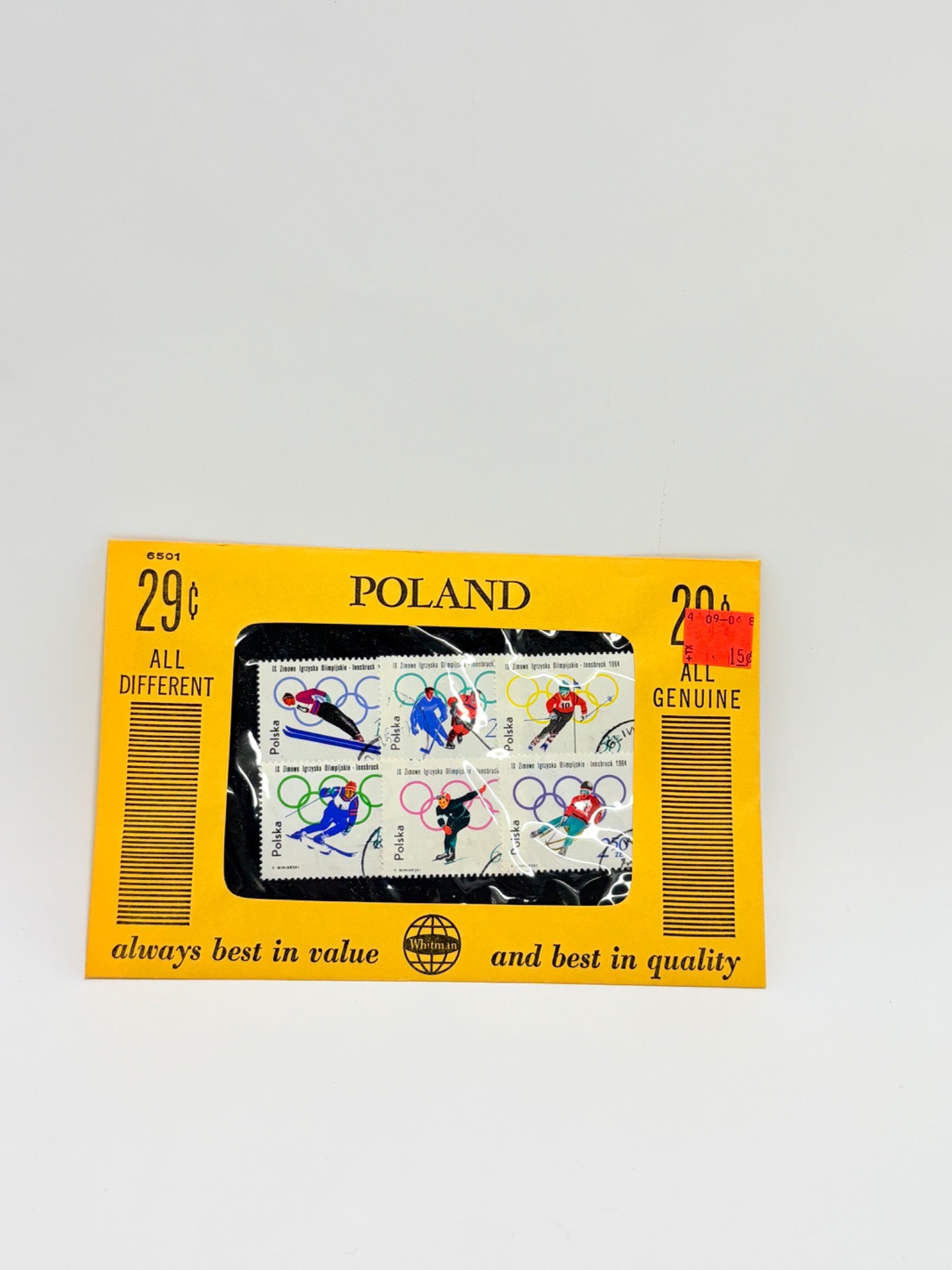 Pack of Polish stamps with a yellow border on a light gray background