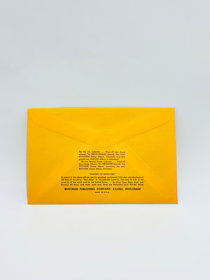 Yellow envelope with text on a light gray background