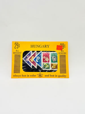 Pack of Hungarian stamps with a yellow border on a light gray background
