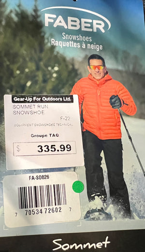 Faber snowshoes packaging with a person wearing an orange jacket and sunglasses, set against a snowy background.