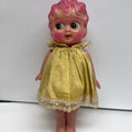 Vintage 1950s Sun Rubber Co. Doll - Pink Molded Hair - Yellow Lace Dress
