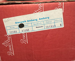 Label on a red background with 'Glaswerk Amberg, Amberg' text