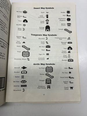 Book open to a page with map symbols for desert, temperate, and arctic regions.